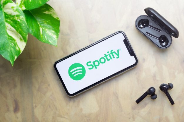 spotify logo display iphone with bluetooth headphones 47840 1552